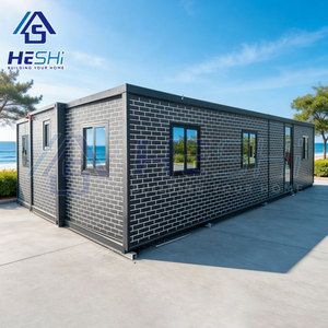 บ้านคอนเทนเนอร์สำเร็จรูป HESHi ขนาด 20 ฟุต 40 ฟุต แบบขยายได้ โครงสร้างเหล็ก ดีไซน์ทรงสี่เหลี่ยมผืนผ้า สำหรับการใช้งานกลางแจ้ง - Product Image 2