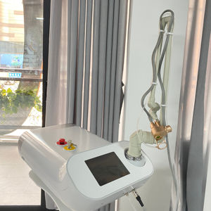 Láser CO2 Fraccionado Portátil de 60W con Articulador para Cicatrices de Acné, Rejuvenecimiento Facial y Reafirmación Vaginal - Product Image 1