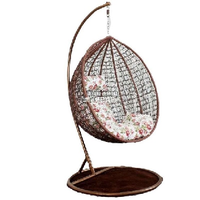 Fauteuil suspendu en rotin en forme d'œuf pour patio, avec coussin et support métallique, vente en gros pour fabricants de meubles
