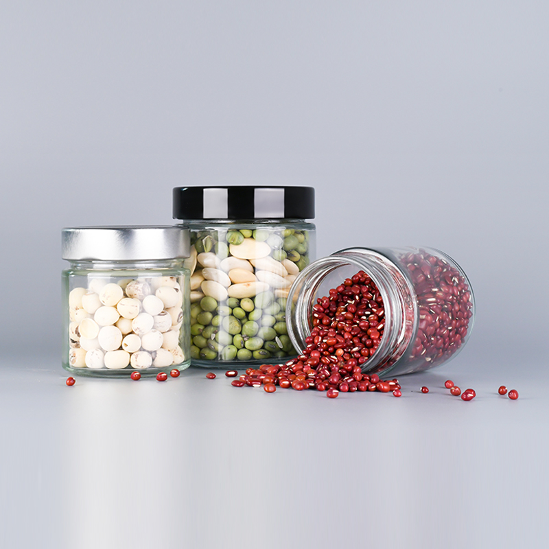Eco Friendly Round Glass Food Storage Jar 50ml 100ml 150ml 250ml 300ml 500ml Glass Kitchen Canisters with Aluminum Screw Lid