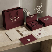 Boîte magnétique bordeaux personnalisable avec logo, conteneur rigide premium avec insert en mousse EVA pour parfums de niche et colognes en gros