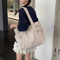 Sac fourre-tout transfrontalier 2026, nouveau style simple et tendance, sac à bandoulière moyen à fermeture éclair grande capacité, style artistique quotidien, sac mère-fille