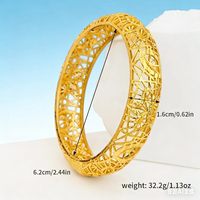 Vente en gros de bracelets creux plaqués or 24 carats, en alliage, larges, à motifs floraux en filigrane, bijoux de mode de mariage de Dubaï pour femmes