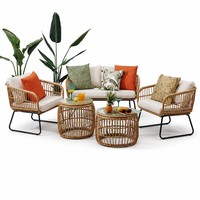 Ensemble de meubles de patio 5 pièces avec tables basses rondes uniques en forme de tonneau et base en métal moderne de type traîneau