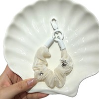 Chaîne de téléphone mini en alliage double couche style coréen avec strass, porte-clés pour femme, ornée d'un nœud et d'un breloque de sac