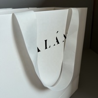 Sacs en papier texturé de luxe avec logo personnalisé et poignée en ruban pour le shopping, l'emballage et les expositions