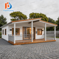 Maison conteneur pliable extensible, directement de l'usine, résistante au vent, isolée, préfabriquée, mobile, avec terrasse, toit à pignon et escalier