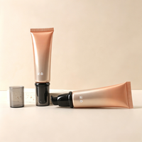 Tube souple rond en plastique noir personnalisé de 50 g, tube de 50 ml pour fond de teint et crème pour les yeux avec pompe sans air