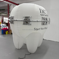 Ballon publicitaire géant gonflable en forme de dent avec logo pour la promotion