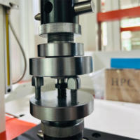 Máquina de prueba universal de doble columna 2KN Servo de computadora con resistencia de almohadilla de goma 220V 1 año de garantía