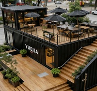 Maison préfabriquée en conteneur SUBEI à double étage pour café, restaurant, avec toit en pente et mur-rideau en verre, bureau