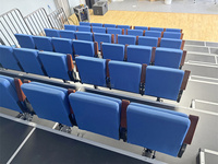 Sièges télescopiques empilables automatiques en acier inoxydable pour stades, gain de place, fournis par Frog Sports Factory