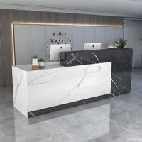 Bureau d'accueil moderne de luxe haut de gamme en aggloméré peint avec façade miroir