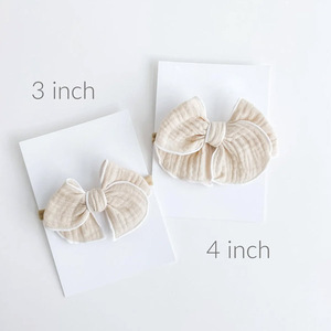 Fascia per <span class=keywords><strong>capelli</strong></span> in cotone tinta unita per neonati e bambini, stile europeo e americano, con fiocchi, confezione in cartone, per tutte le stagioni, per mantenere la bellezza. - Product Image 3