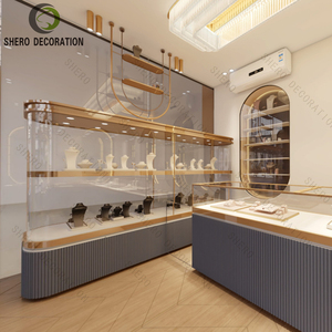 ตู้โชว์เครื่องประดับติดผนังแบบมีไฟ LED พร้อมกรอบสีทองแนวตั้ง สำหรับร้านบูติกเครื่องประดับ - Product Image 1