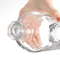 Bouteilles en verre cristal personnalisées de luxe avec bouchon et finition estampée à chaud pour whisky, vodka, gin, tequila et plus encore
