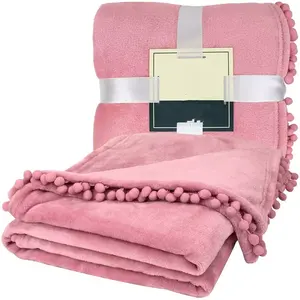 批发工厂定制时尚柔软素色法兰绒毛毯带流苏Pom家居用品