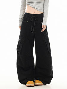 กางเกงวอร์มขากว้างสไตล์อเมริกัน ดีไซน์จีบหลายกระเป๋า ทรงหลวมสบาย ทรงบานาน่า เอวต่ำ ลำลอง ผ้าฝ้าย 100% ยูนิเซ็กส์ เอวยางยืด - Product Image 5