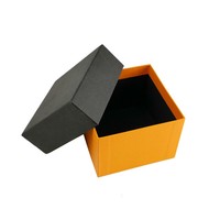 Boîte cadeau de parfum personnalisée à blocs de couleur, base et couvercle orange et noir avec insert en éponge pour parfum de luxe