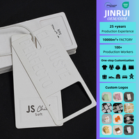 Étiquette personnalisée de marque de mode JINRUI, 400g, papier écologique, impression UV, design en relief, design convexe excitant, chaussures, sacs, vêtements haut de gamme
