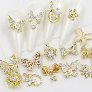 免费送货混合形状设计陨石金色蝴蝶珍珠指甲珠宝蝴蝶链合金金属锆石指甲艺术水钻