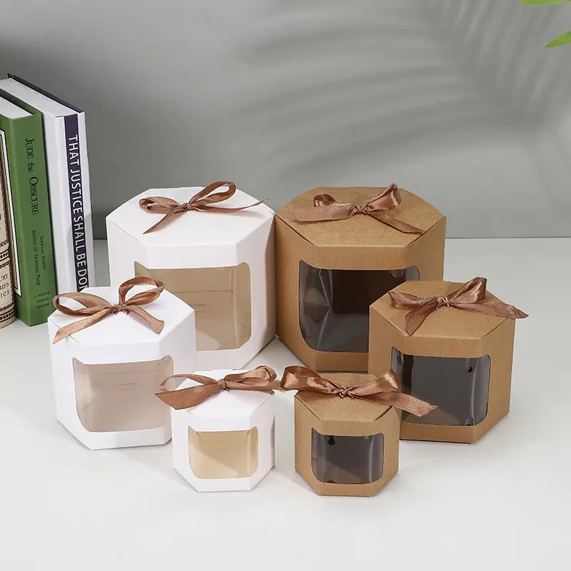 Scatola regalo modello di nastro per finestra di carta kraft personalizzata all'ingrosso scatola di imballaggio regalo per feste esagonali scatole di carta da dessert per torte