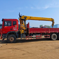 Grúa de Camión Usada Confiable de 12 Toneladas con Caja de Carga de 8.5m, Pluma Larga para Transporte de Materiales a Distancias Medias y Cortas
