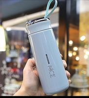 Vente en gros 2023 nouvelle belle doublure en verre bouteille d'eau créative Simple grand magasin bouteille d'étudiant cadeau publicitaire bouteille thermos