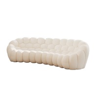 Canapé-lit sectionnel moderne avec rembourrage en éponge, texture alvéolée et design bombé pour salon de villa