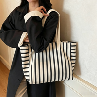 Sac de courses polyvalent à longue poignée en toile de coton rayée avec poche intérieure zippée pour le rangement des fournitures scolaires des étudiants