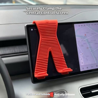 Support de téléphone à ventouse en silicone flexible, design créatif pliable en forme de X, support universel pour tablettes et utilisation en voiture, noir/orange