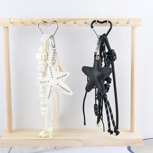Serie cuerda trenzada carta tendencia estilo deportivo cuerda caballo estrella de mar corazón colorido bolso colgante bádminton llavero cuero encantos - Product Image 1
