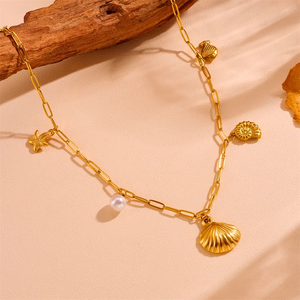 Venta al por mayor de joyas lindo dulce estrella Arco nudo Shell titanio acero perla 18K chapado en oro ahueca hacia fuera el colgante del collar - Product Image 3