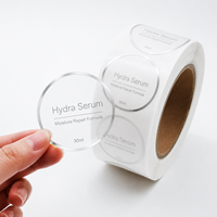Étiquette personnalisée en rouleau pour flacon de sérum transparent avec feuille d'argent, autocollant cosmétique transparent et étanche pour emballage de soins de la peau