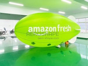 Vente en gros de dirigeables gonflables géants personnalisés à l'hélium, flotteurs verts pour événements, ballon d'<span class=keywords><strong>avion</strong></span> gonflable à l'hélium avec lumière - Product Image 1