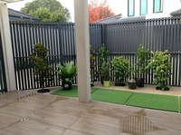Panneau mural moderne en PVC WPC imperméable à l'eau avec rainures à emboîtement pour usage intérieur/extérieur