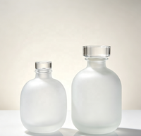 Vente en gros de bouteilles en verre ovales givrées de 300 ml pour jus, thé et boissons