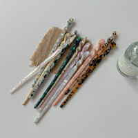 Vente en gros d'accessoires capillaires simples pour femmes : bâtonnets à cheveux, épingles à cheveux en acétate tendance style chinois et fourchettes à cheveux colorées pour femmes