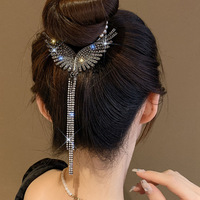 Barrette à cheveux en forme d'aile d'ange entièrement recouverte de strass brillants, élégante, avec pompon en perles, barrettes pour queue de cheval, chignon, bandeaux pour femmes et filles, accessoires pour cheveux