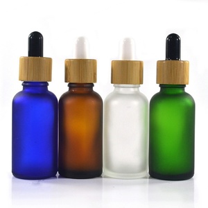 บรรจุภัณฑ์เครื่องสำอาง ขวดแก้วหยดขนาด 30 มล. สีดำด้าน สำหรับเซรั่มและน้ำมันหอมระเหย ฝาไม้ไผ่พิมพ์ลาย พร้อมหลอดกระดาษเปล่า - Product Image 5