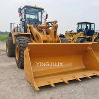 Chargeuse sur pneus CAT 966H/966G d'occasion, godet robuste pour le chargement de roches en carrière, bon état, prix bas