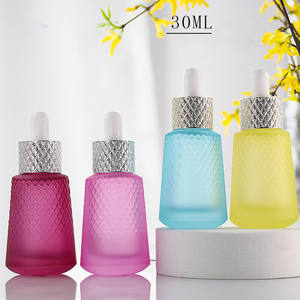Venta al por mayor 30ml Botellas cuentagotas de vidrio Patrón de piña Uso para máscara de aceite de esencia Rosa Amarillo Verde Azul <span class=keywords><strong>Rojo</strong></span> Ámbar Negro Colores - Product Image 2