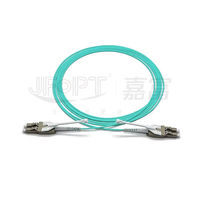 Kabel Patch Fiber LC LC OM3 Duplex Uniboot 3m Push Pull Tab 10G Multimode Low Loss LSZH untuk Pusat Data