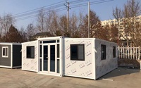 Maison pliante préfabriquée à double aile extensible, installation rapide, structure métallique anti-corrosion, bâtiment modulaire mobile.