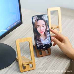 Solid wood phone <b>stand</b>, rotatable and foldable portable desktop base, black walnut wood, new type of lazy <b>stand</b>. - Product Image 5