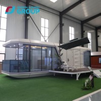 Capsule spatiale intelligente de 40 pieds alimentée à l'énergie solaire, mini-maison, maison-capsule spatiale avec remorque