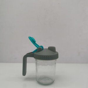 ขวดแก้วใสทรงตรงพร้อมฝาพลาสติกแบบพลิกมีหูจับ ภาชนะแก้วใสสำหรับห้องครัว - Product Image 1