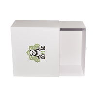 Boîte de rangement moderne de luxe en carton blanc personnalisé avec logo imprimé, gaufré, laminé mat, recyclable, avec poignée en ruban