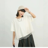 Nouveau T-shirt en coton patchwork maille d'été 2026, chic à la française, superposé sculptural, gris, col rond, polyvalent pour le quotidien