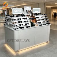 Exhibidores de Gafas con Marco Óptico Naranja Vibrante, Base LED Brillante, Estantes de Vidrio Templado Escalonados, Soporte para Exhibición de Gafas